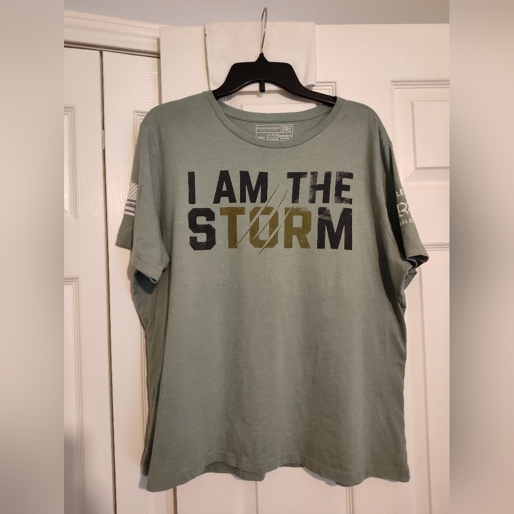 Relentless Rebel 2XL Graphic Tee “I Am The Storm” Green Flag Patriotic Shirt EUC